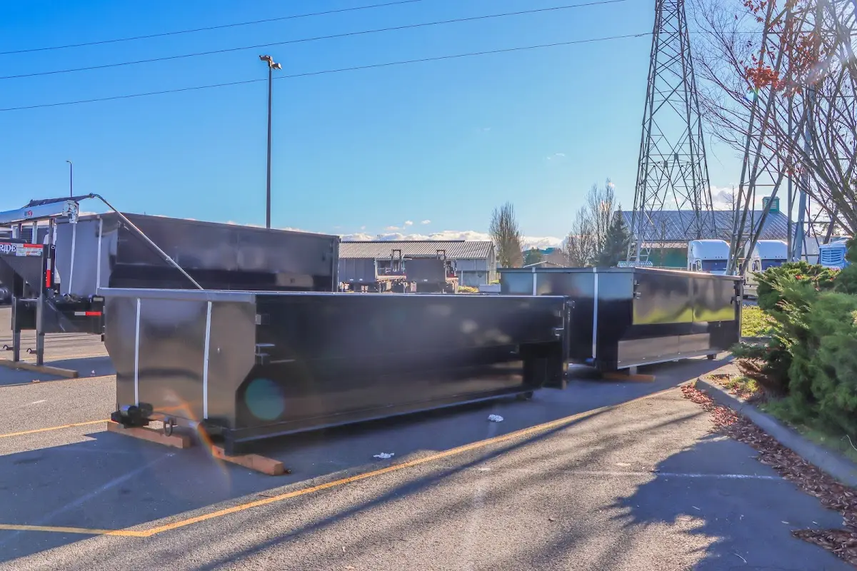 Roll-off dumpster ready for waste disposal at job site for Concrete Dumpster Rental in Metuchen